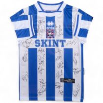 FOOTBALL INTEREST - a signed 2003/04 Brighton & Hove Albion football shirt, signed by the entire