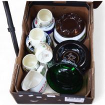 A quantity of pub related ceramic items, including various ashtrays and jugs, advertising various