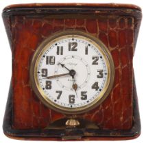 ASPREY - an early 20th century Asprey's travelling alarm clock, 8-day movement with white enamel