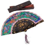 A Chinese Mandarin fan, having a double-sided polychrome leaf painted with figures in buildings