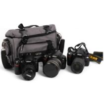 A Nikon D60 digital camera, with associated Nikkor 28mm lens, a Nikon D40 digital camera, with