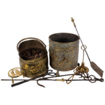 A brass coal bucket, and a brass coal bin with lion mask ring handles and armorial decoration,