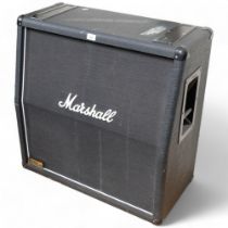 A Marshall 1960-A300W angled speaker cab. Unclear whether this is working condition or not