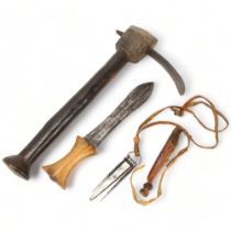 Three African handmade tools, a carving adze, a steel tool in leather sheath and a Congo Knife,