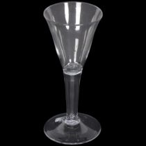 An 18th century moulded wine glass, of conical tapered form, H15.5cm