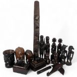 A pair of carved ebony candlesticks, 30cm, 2 pairs of figures, a pair of boxes with elephant