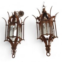 A pair of Vintage wrought-metal hexagonal hanging lanterns, with foliate designs, 18cm across