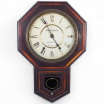 A wooden-cased drop-dial American wall clock, 8-day movement, clock face reads "Passmore,