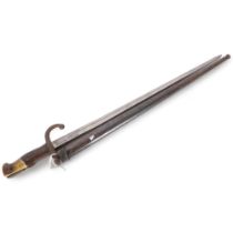 A French military model 1874 bayonet and scabbard, blade length 52cm, overall length 66cm, serial