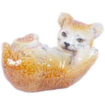 A small Italian pottery playful lion cub, L22cm