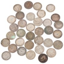 A small collection of silver thru'penny bits