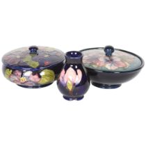 MOORCROFT - 3 pieces of blue ground tube-lined Moorcroft, including 2 powder bowls and cover, and