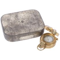 T G & Company Ltd London, a military brass compass, Mk II model 1940, NA266322, and a 1941