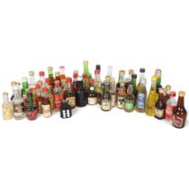 A selection of approx 15 alcoholic miniatures, including various Brandy, Gin, Vodka, Sambuca,
