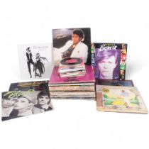 A quantity of vinyl LPs and 7" singles, including various genres and artists, such as The Rolling