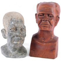 A carved soapstone African head, H23.5cm, and a similar carved wood head