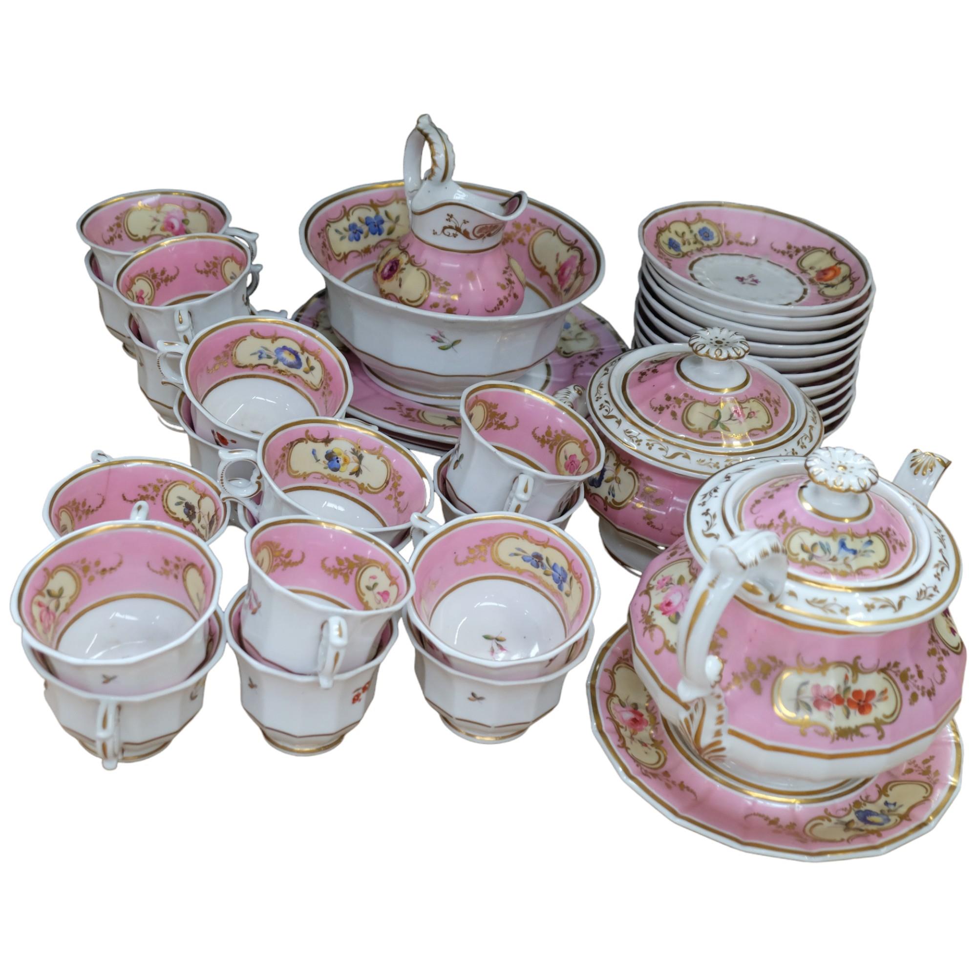 A Victorian porcelain teapot, sucrier and jug, and 17 cups, 11 saucers, 2 plates and slop bowl