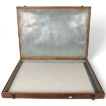 An oak-framed panelled table-top box, with liner, 85cm across