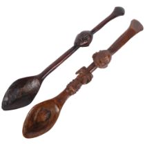 2 similar African Tribal wooden spoons, likely tourist pieces, larger spoon has fertility carving