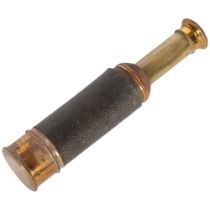 A Negretti & Zambra "The Rambler" small 5-draw telescope, with leather covering, closed length 10.