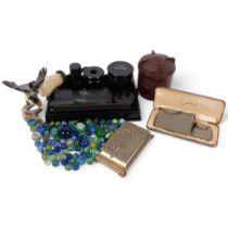 An ebony dressing table set, Colibri boxed lighter, Bakelite box, Goebels Great Tit, marbles, and
