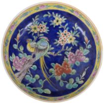 A hand painted Oriental centrepiece bowl, with floral blue margined outer border, and similar floral