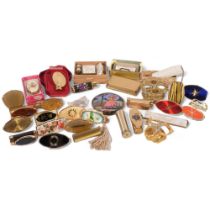 A collection of compacts, lipstick holders, butterfly wing mirror, etc