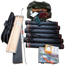 A large quantity of archery equipment, including boxes of arrows, a bow, wooden box, carrying cases,