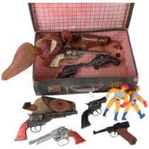 A quantity of Vintage toy guns, various cap gun and other items, including various Crescent Toy