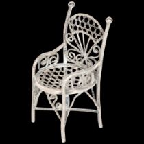 A Continental miniature silver doll's armchair, apparently unmarked, 6cm No damage or repair,