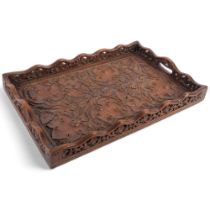 Ornate carved hardwood tray with foliate decoration, 53.5cm