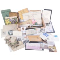 A box of various Vintage postcards, a Boston Massachusetts pendant, First Day Cover stamps, deeds
