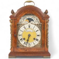 A burr-walnut dome-top mantel clock, a brass French 8-day movement with moon phase, retailed by