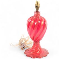 A Murano red glass table lamp of swirled design, height 36cm overall