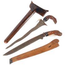 A Borneo Parang and scabbard, L47cm, and a Malayan Kris and scabbard, L44cm