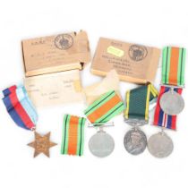 A Second World War medal trio, awarded to Mr R J Spiers, all in original packing and boxed, a King
