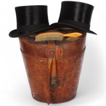 A large Victorian brown leather double hat box, with silk-lined interior, together with 2 black