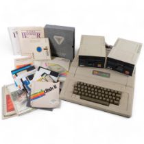 An Apple II Series computer, with 2 associated hard drives, model AA11040C, serial no. 034, with