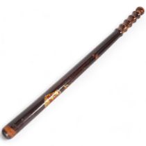 A 19th century turned hardwood truncheon, with ribbed handle and gilded crown decoration, L60cm
