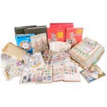 A large quantity of UK and worldwide used stamps, albums, loose stamps, etc