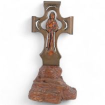 A large carved wooden cross with figure, on a naturalistic base, 65cm