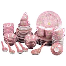 An extensive Japanese pink ground dinner service for 8 people 1 saucer and 1 larger side plate