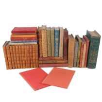 Vintage leather-bound books, including the Classics, and other novels