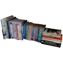 A quantity of military and war related reference books including The Day of the Typhoon by John