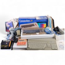 A Sinclair ZX81, a Commodore 64, and an Atari 520ST computer console, all with associated