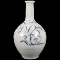 A 19th century Japanese sake bottle vase, blue and white floral decoration, H27.5cm There is a
