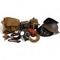 2 similar World War II Brodie helmets, ration tin and drinks bottle, gas mask etc