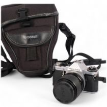 A Pentax ME Super camera, with associated Vivitar MC macro focussing zoom lens, 35-70MM, serial