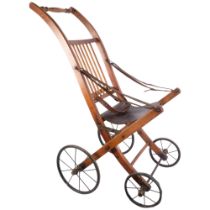 A Vintage child's folding pushchair