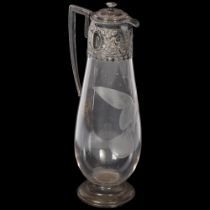 Edwardian Claret jug with embossed plated mounts, and engraved bird decoration, H30cm